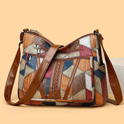 Bolso de mano de piel con mosaico